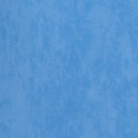 Blue printed surface with visible mottling, showing the uneven colour distribution typical of poor print quality.